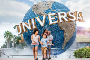 Guests in front of Universal Orlando Resort Globe