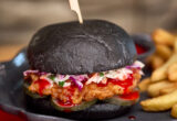 Universal Epic Universe – Das Stakehaus at Dark Universe – “Blood” Orange Chicken Sandwich